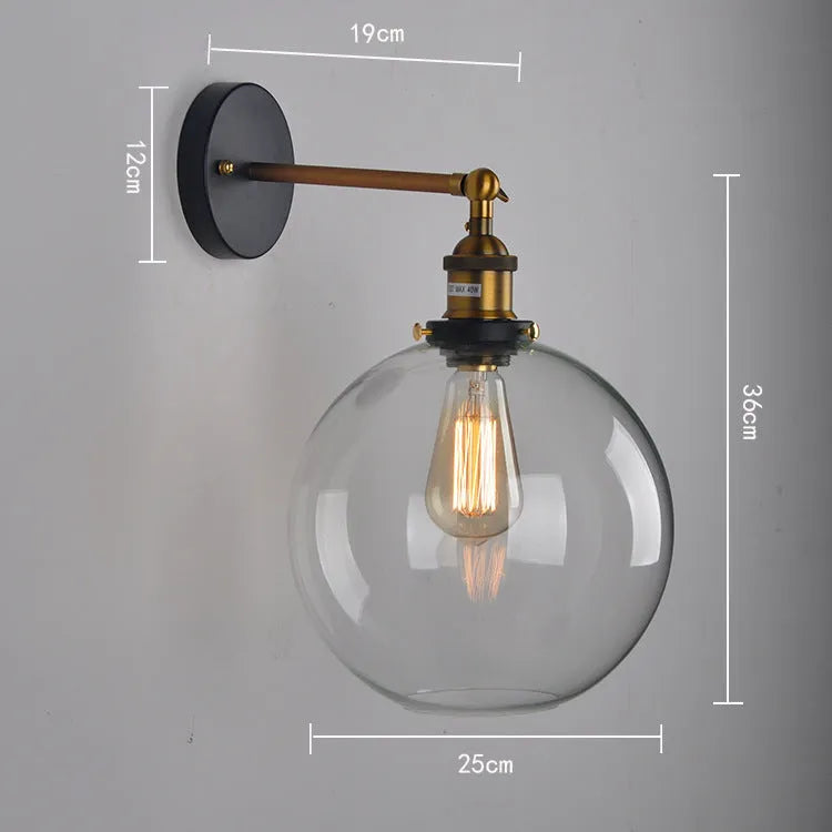 20cm round glass ball wall lamp in amber, smoke grey, or transparent on aluminium holder.