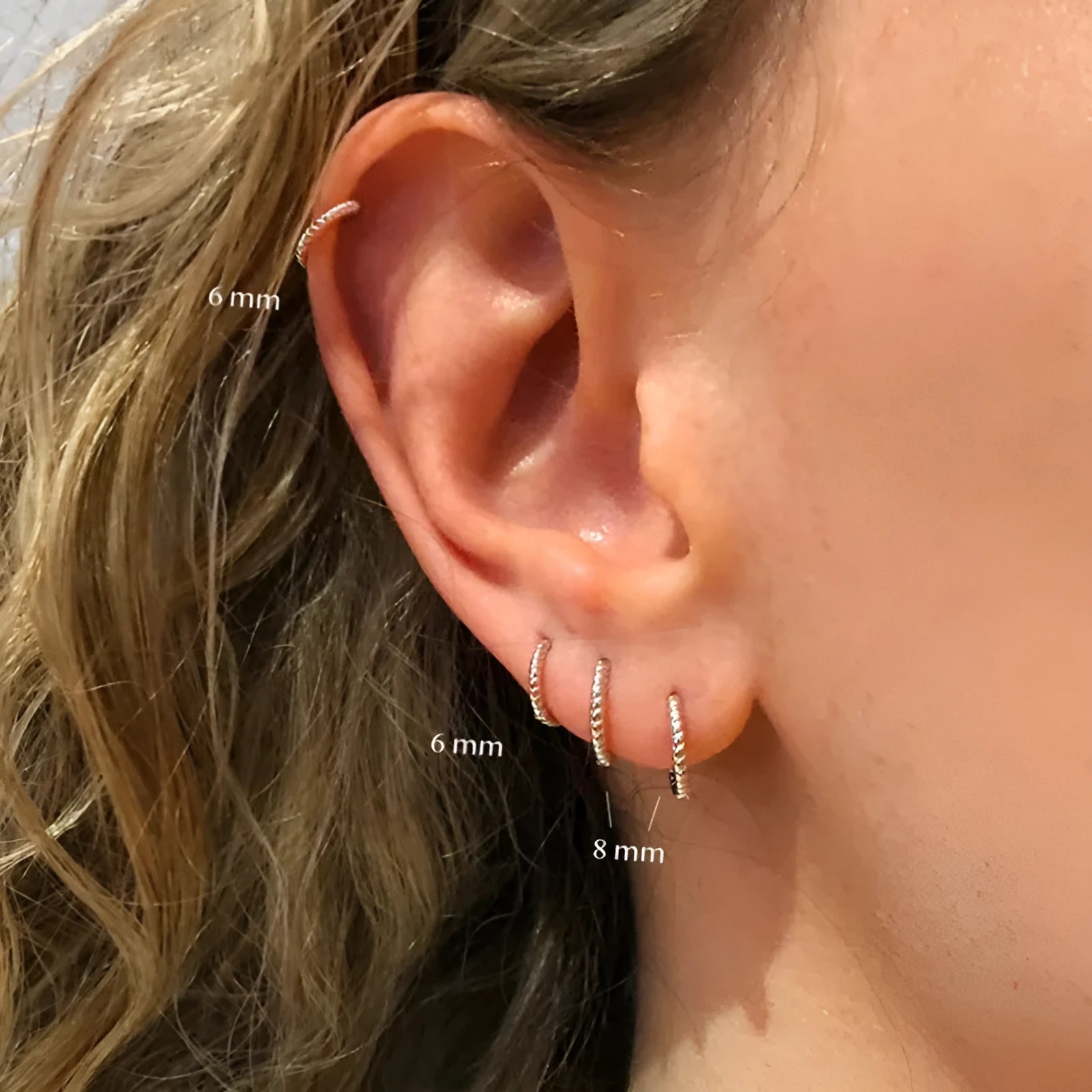 Sterling silver twisted ring earrings in geometric round design with gold or white gold finish