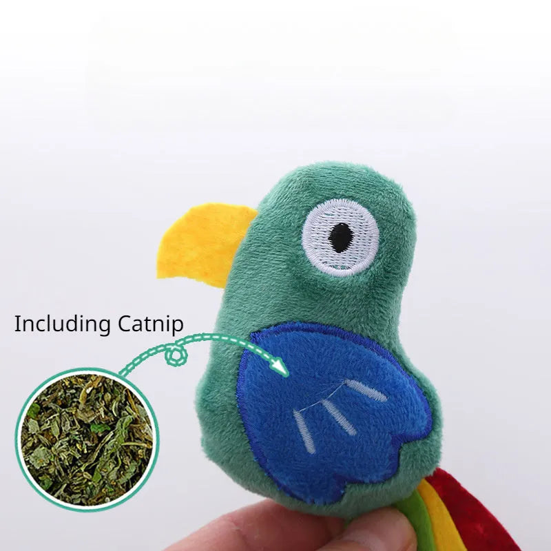 Soft plush cat toy shaped like a cow, a parrot, and a crocodile, each containing catnip for pet play.
