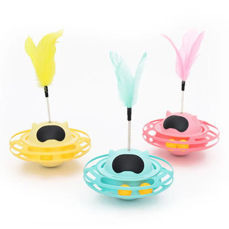 Pink cat tumbler turntable toy with automatic motion mechanism for indoor feline play