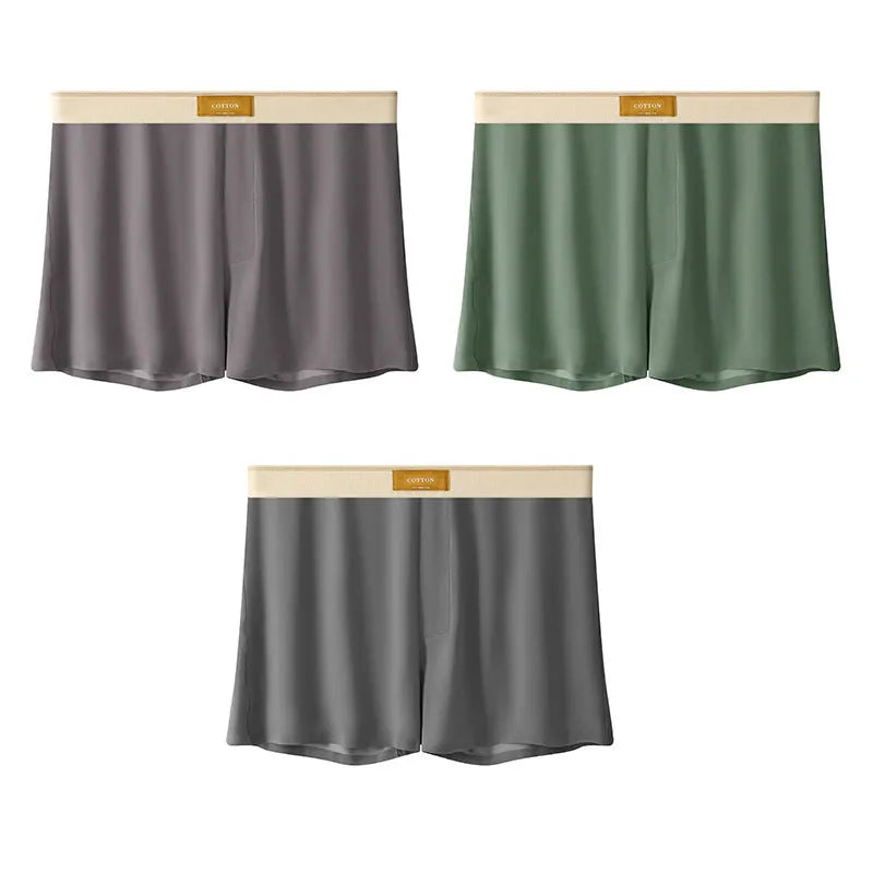 Men's solid colour loose ice silk underwear in a pack of three, shown in beige, black, and grey.