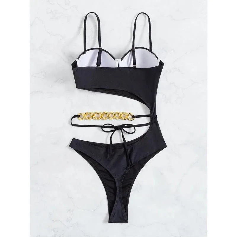Ladies one piece solid colour swimsuit with chest pad, available in black and pink, sizes S M L