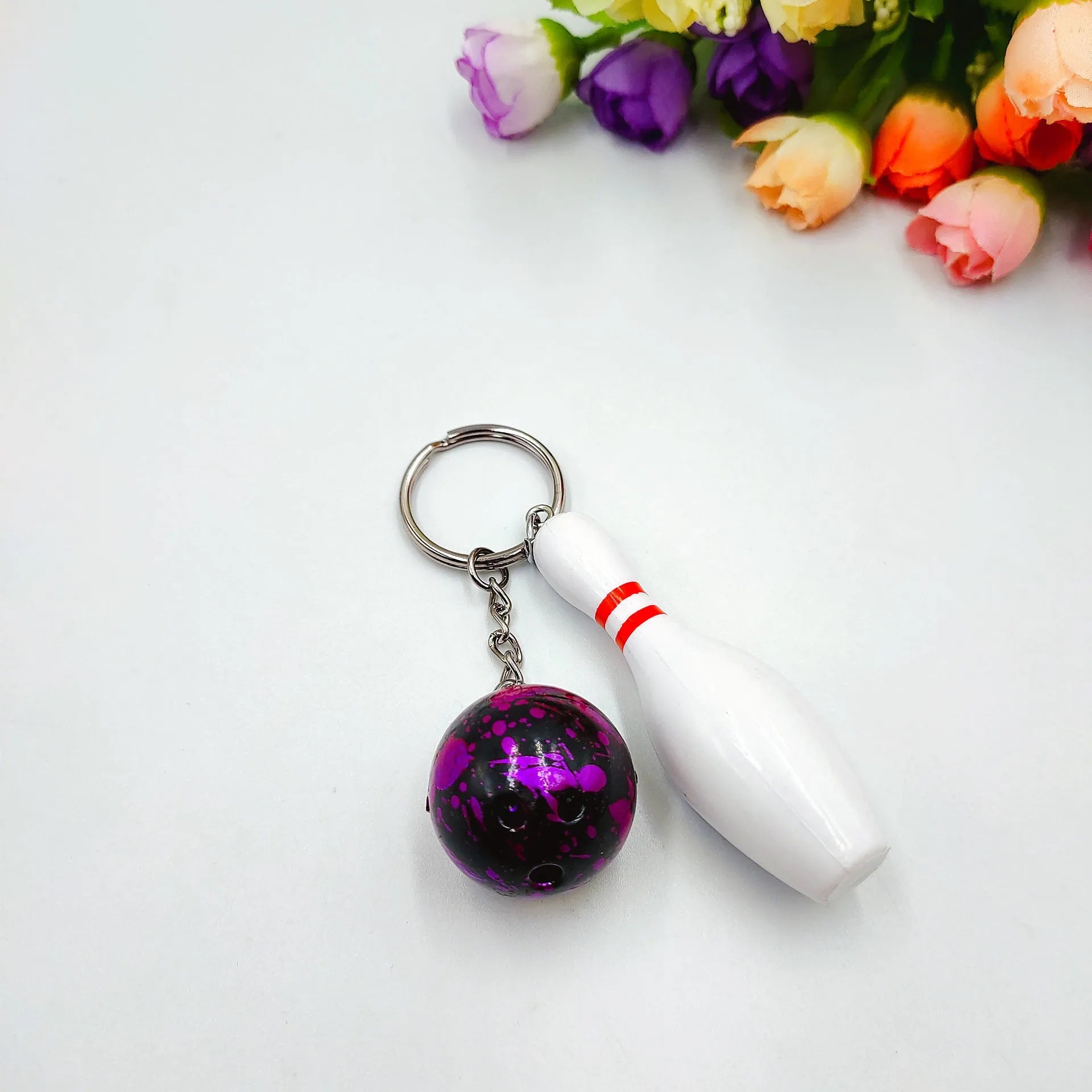 Mini bowling simulation keychain pendant in PVC metal available in four colours