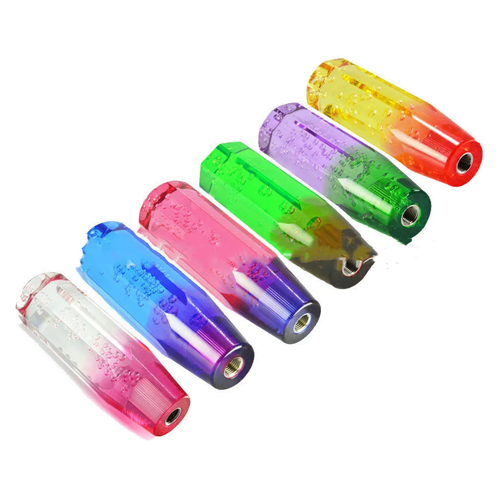 Acrylic crystal gear head shift lever showing two-colour transparent design in vehicle interior