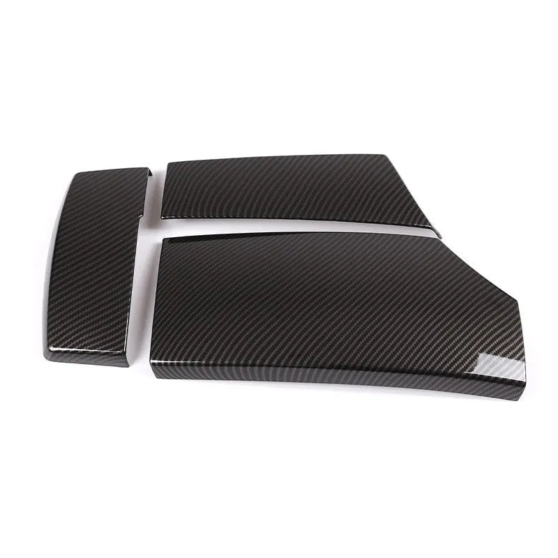 Three black ABS armrest protective covers with carbon fibre pattern for car centre console