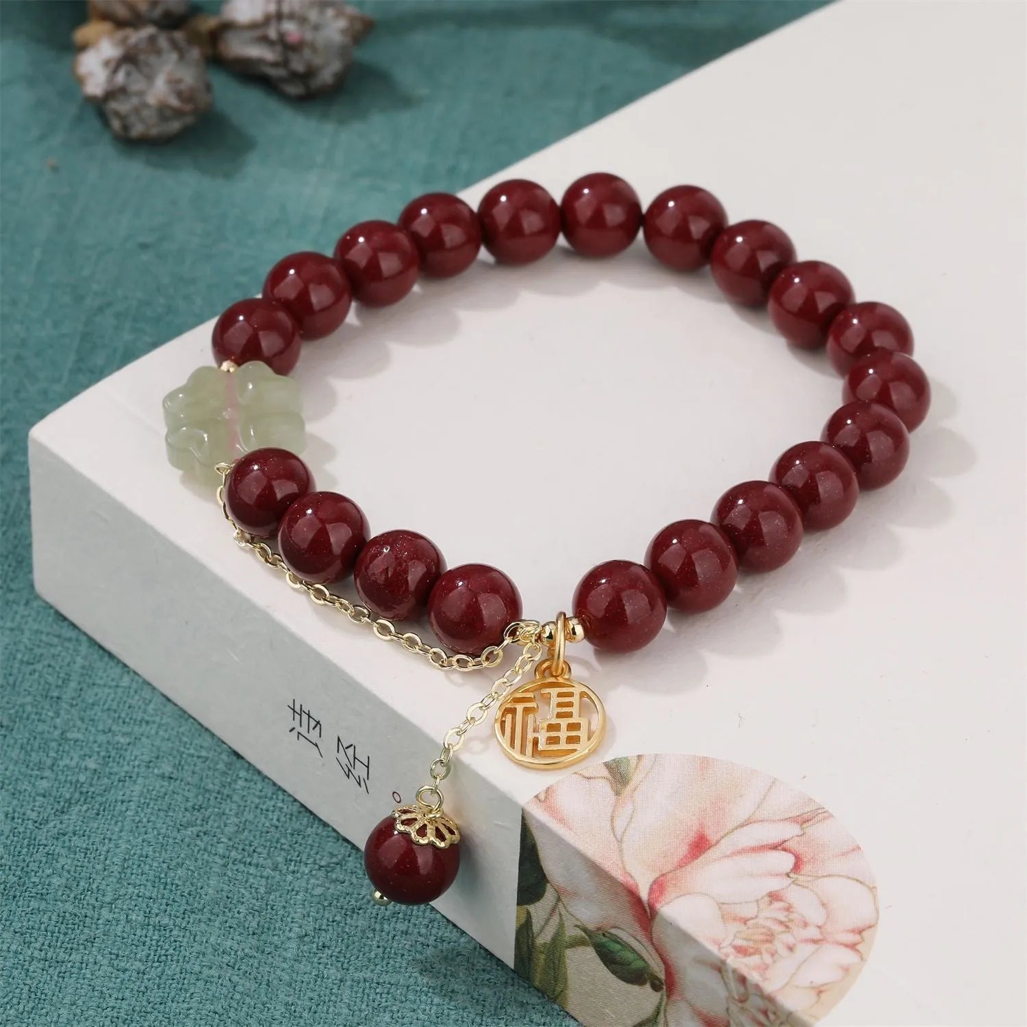 Women's cinnabar national style bracelet with purple gold sand finish and Fu character peach blossom charm