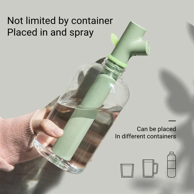 Transparent plastic USB portable humidifier with water tank on desk