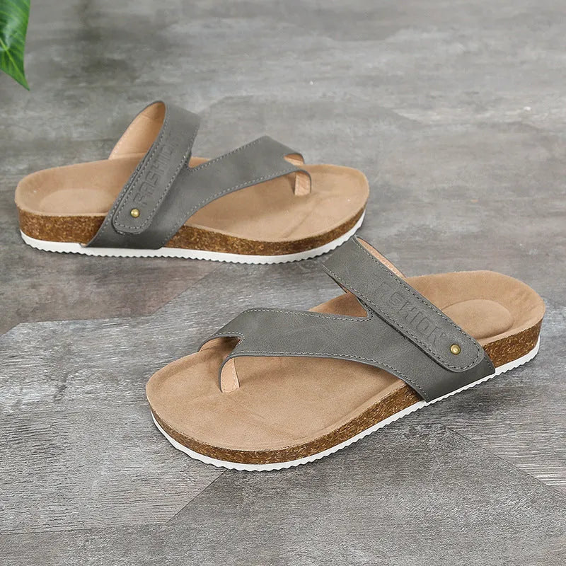 Flat toe ring flip-flops with a thick foam sole in a solid colour, shown in blue.