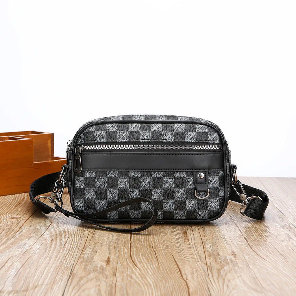 Men's black geometric pattern PU messenger bag with a shoulder strap, shown horizontally.
