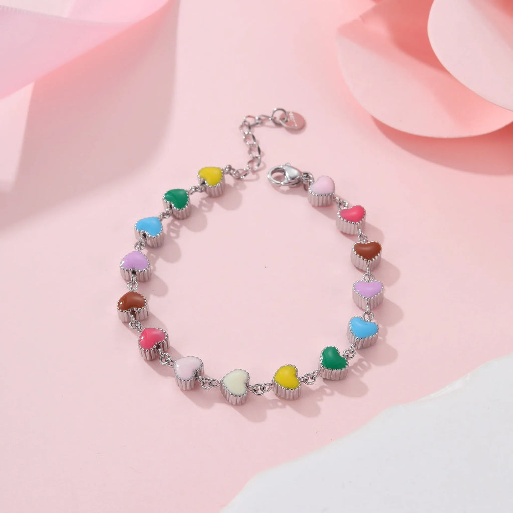 Women's titanium steel bracelet with love heart charm and colourful oil necklace pendant in gold and steel finishes