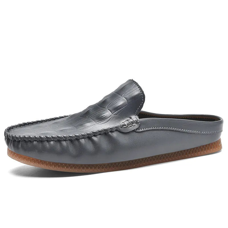 Men's black breathable semi-slippers with an artificial PU upper and rubber sole, shown from the side.