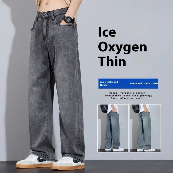 Straight-leg denim trousers in UK2560 blue with wide-leg silhouette and zip fly opening