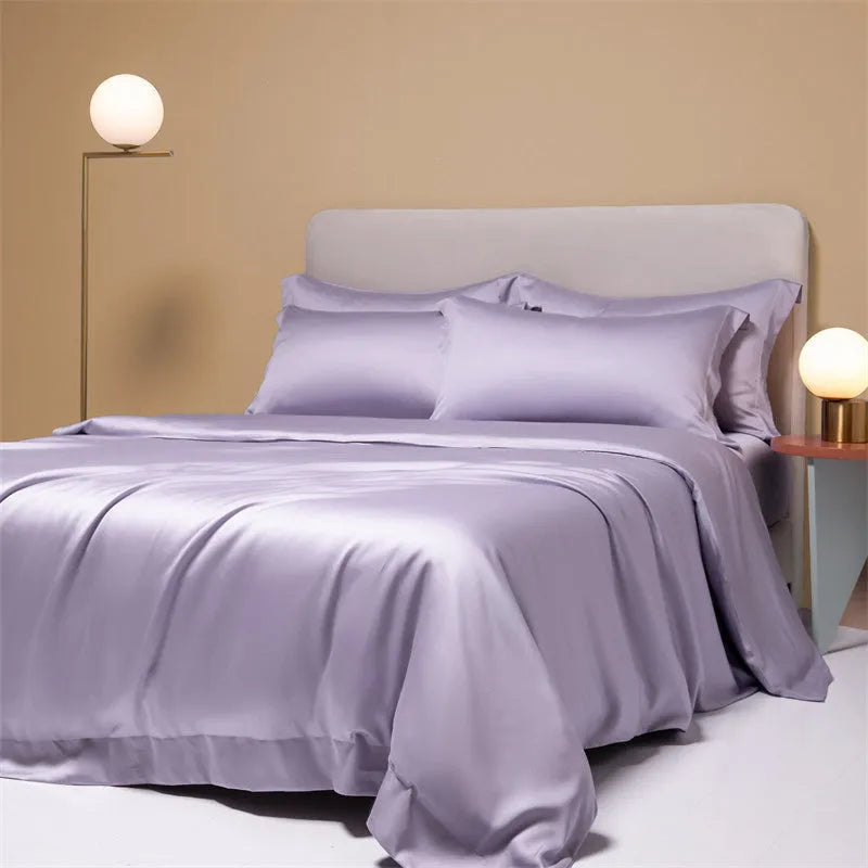 Luxury Tencel Lyocell bedding set with quilt cover, sheet, and pillowcases in grey.