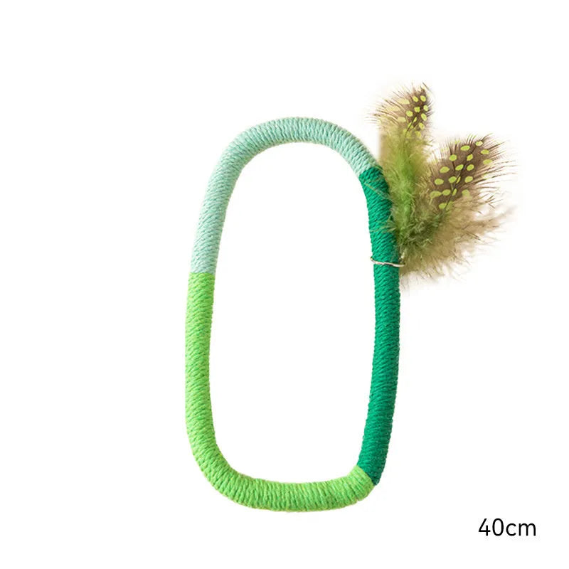 Green circular cotton rope cat toy with white feathers and catnip for chewing and play