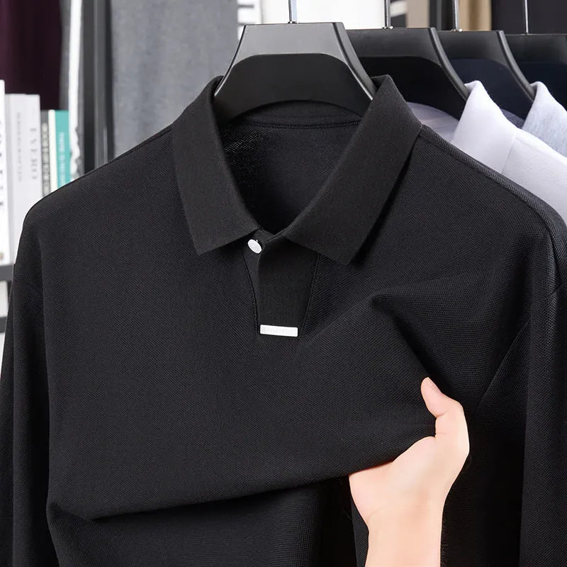 Men's loose-fit cotton polo shirt with lapel collar in grey, shown on a model.