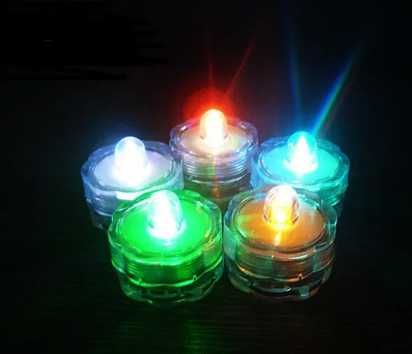 Set of colourful electronic candle lights with CR2032 battery, submersible, 3cm diameter, 2.6cm height, plastic housing