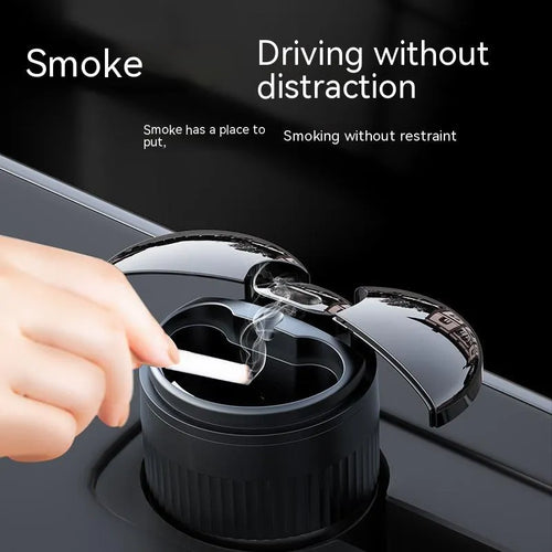 Black smart infrared metal car ashtray with lid on a car dashboard.