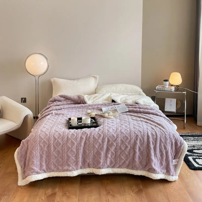 Polyester thermal flannel blanket in beige colour, shown folded to display its thick texture and modern style