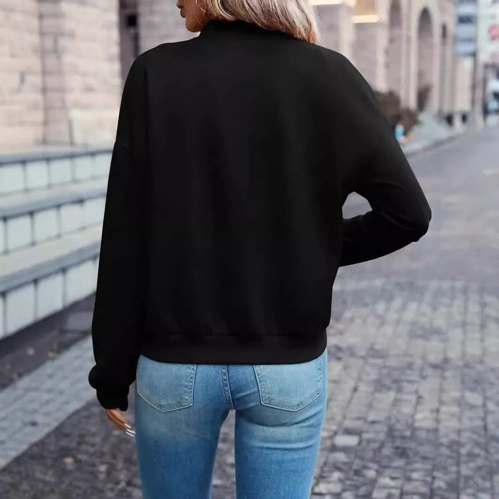 Women's black casual zip jacket with long sleeves and faux pockets