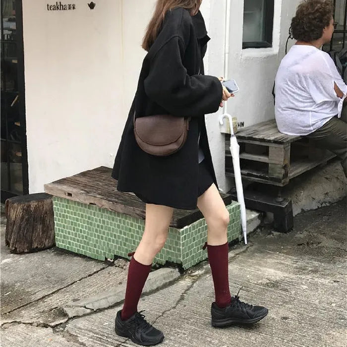 Women's Korean-style loose mid-length solid colour overcoat in black with long sleeves
