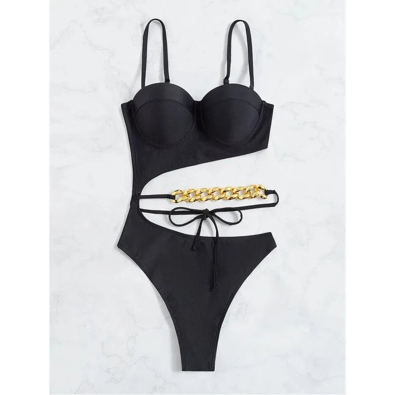 Ladies one piece solid colour swimsuit with chest pad, available in black and pink, sizes S M L
