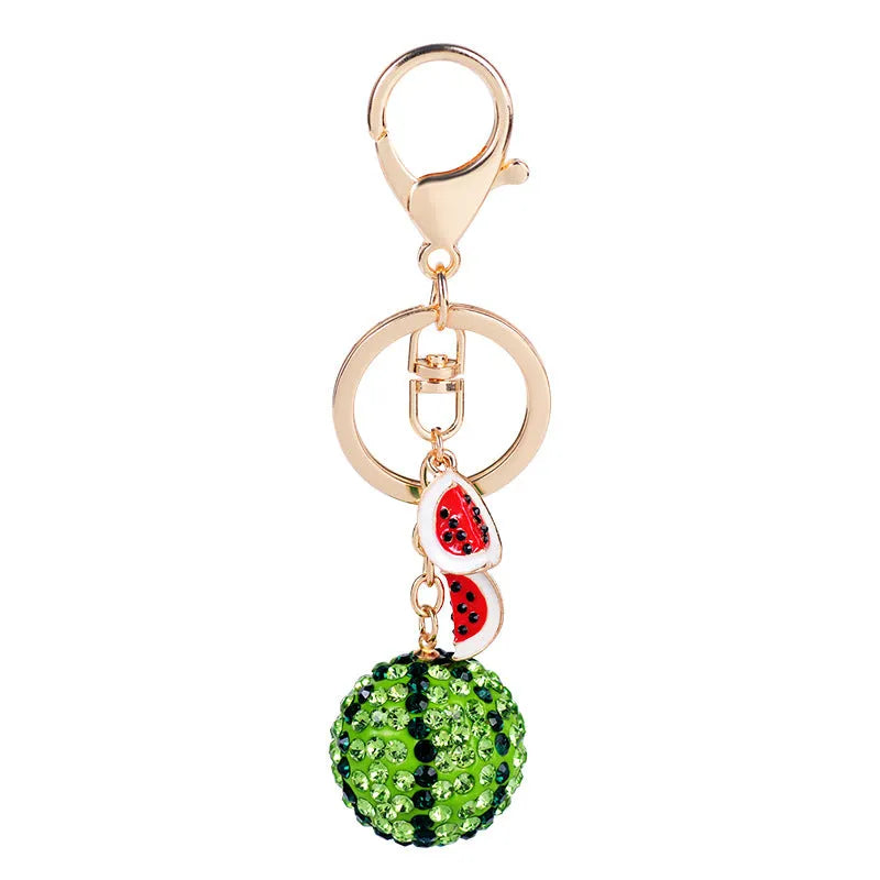 Green watermelon-shaped zinc alloy keychain measuring 12cm with fruit diamond design
