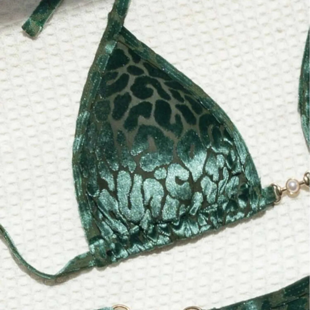 Blue leopard print T-shaped women's bikini swimsuit set on a mannequin.