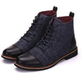 Men's leather motorcycle boots with silver belt buckle details on the side, shown with a rubber sole.