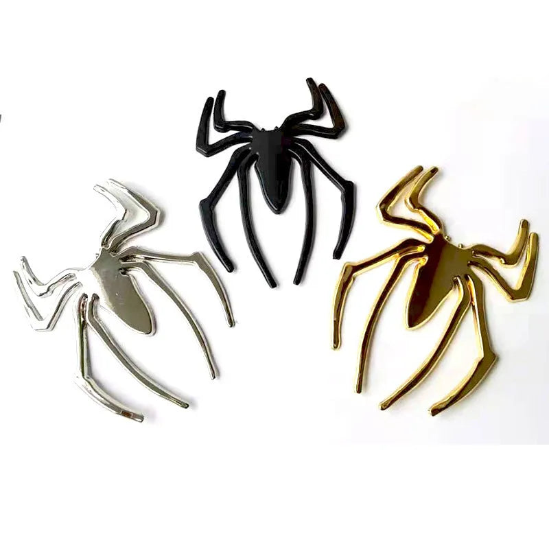 Zinc alloy 3D metal spider car sticker in gold, silver, black, and red colours.