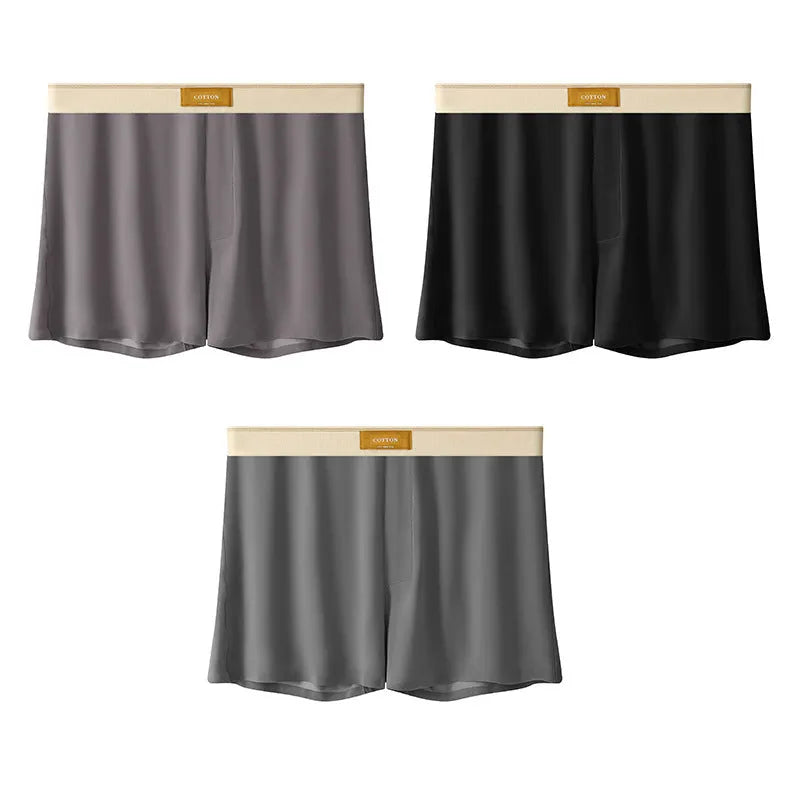 Men's solid colour loose ice silk underwear in a pack of three, shown in beige, black, and grey.