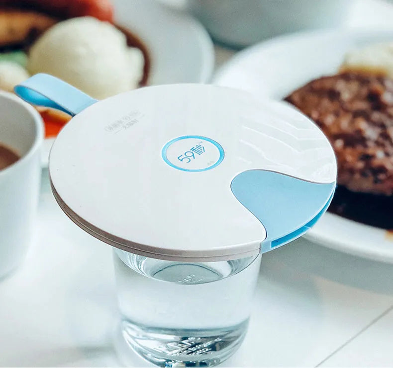 Portable UV baby bottle steriliser in blue or pink, showing compact size and USB port.
