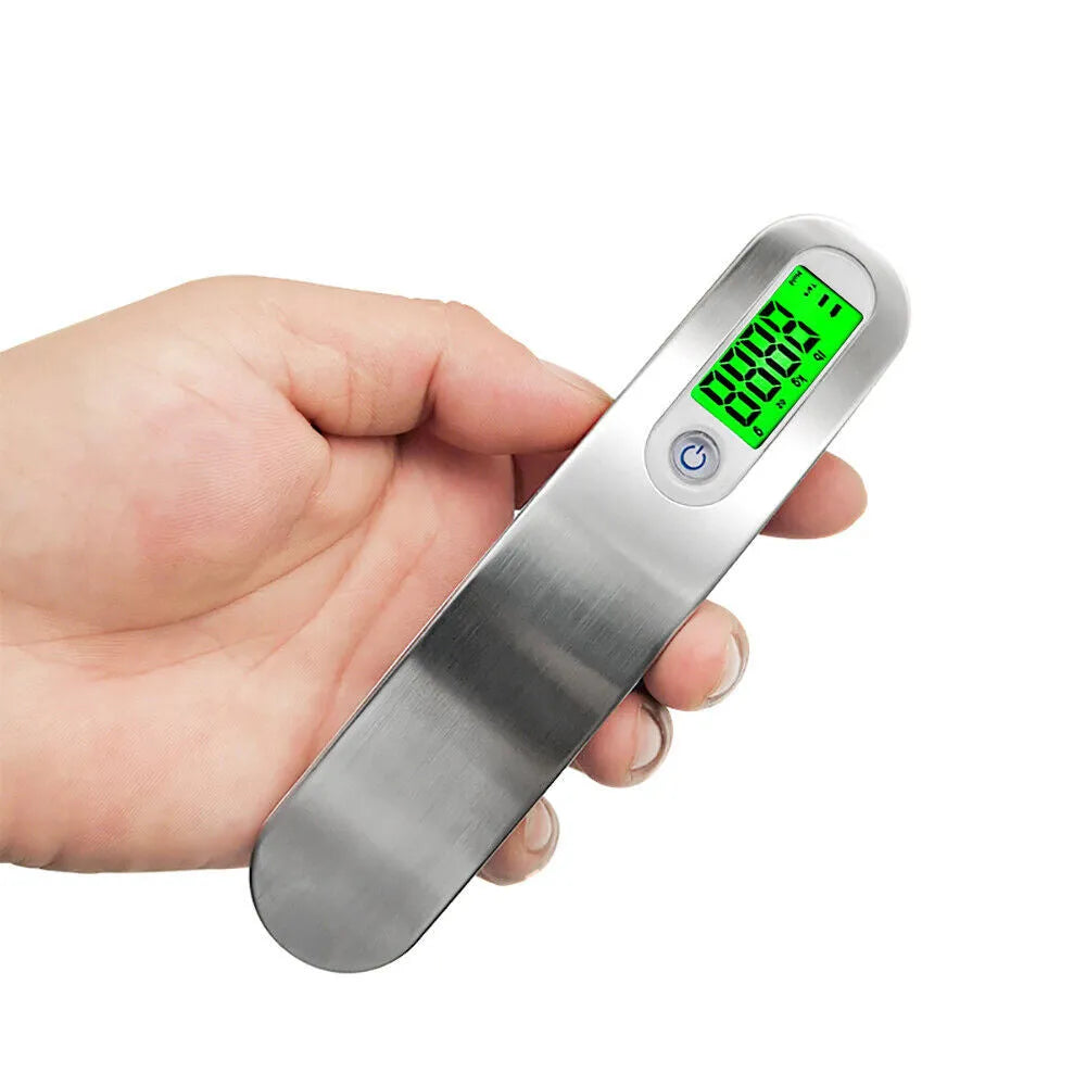 Portable silver LCD digital luggage scale with belt and backlit display showing weight in kg