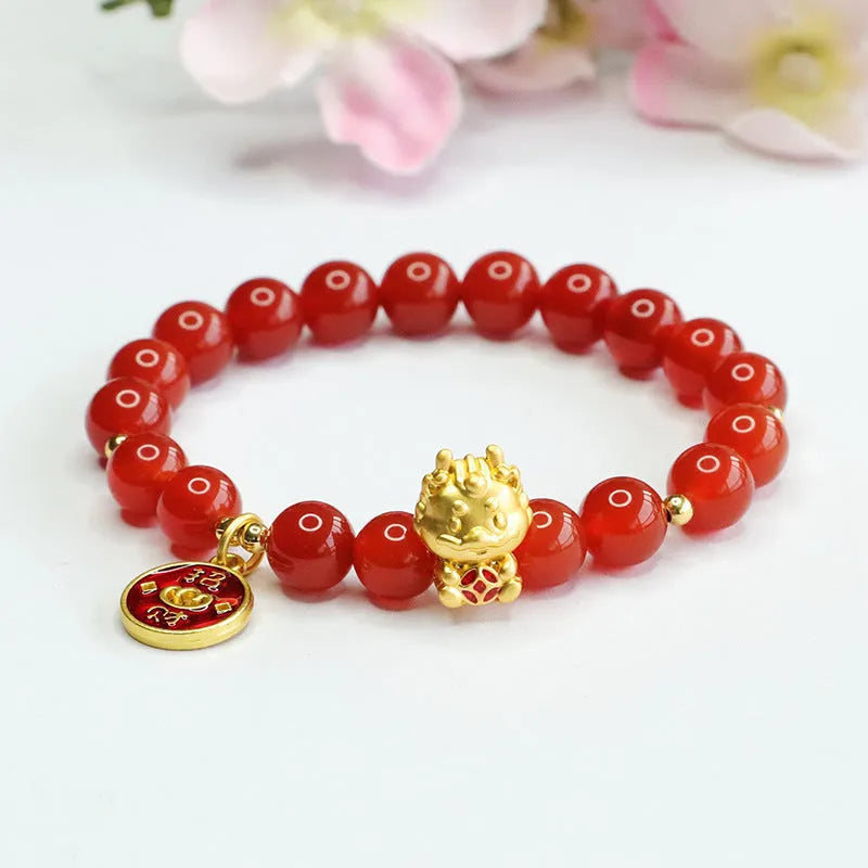 8mm red agate bead bracelet with Dragon charm on black elastic cord.