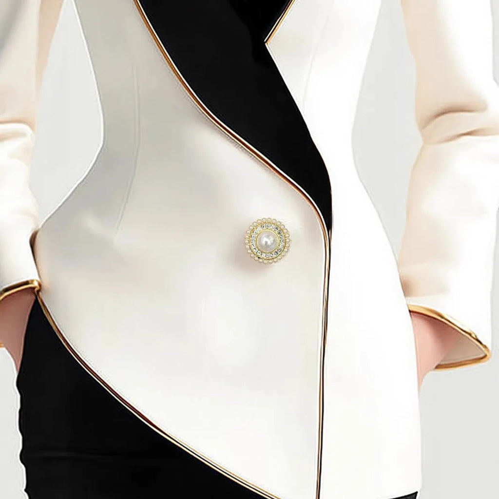 Milky white women's coat with golden edge detailing and pearl button front closure