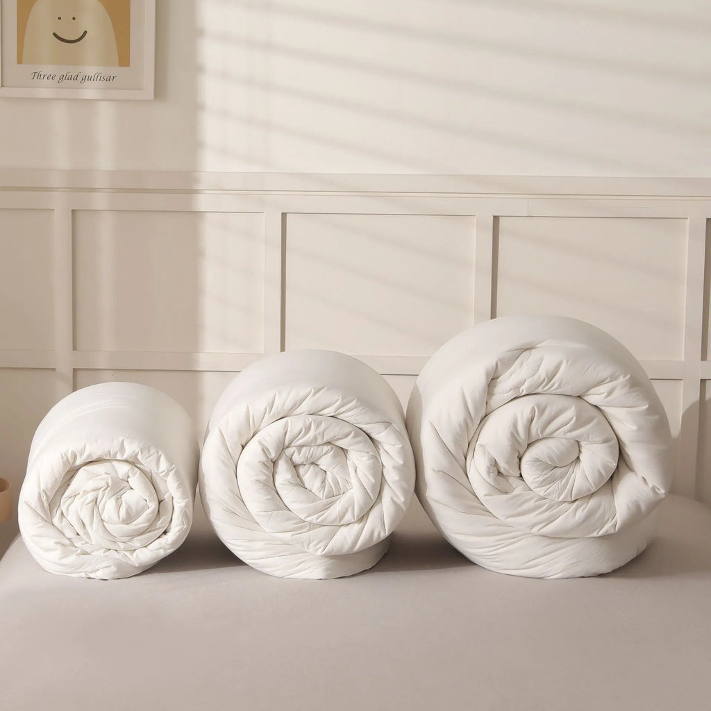 Soybean fibre and pure cotton quilt in white, grey or pink jade, showing twill weave texture.