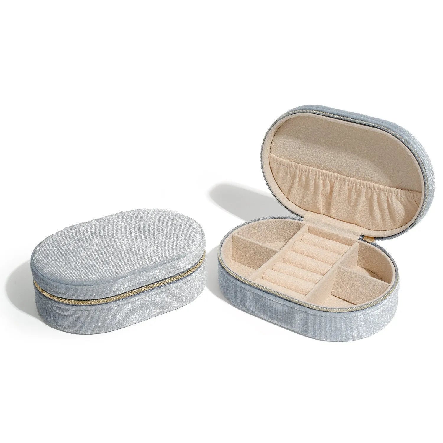 Oval shaped velvet jewellery storage box in multiple colours with flannel interior, measuring 15 by 10 by 5 cm.