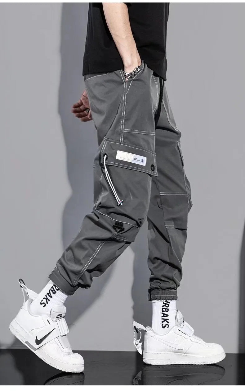 Men's loose fit polyester solid colour trousers in black or gray, autumn casual style, size S to 5XL