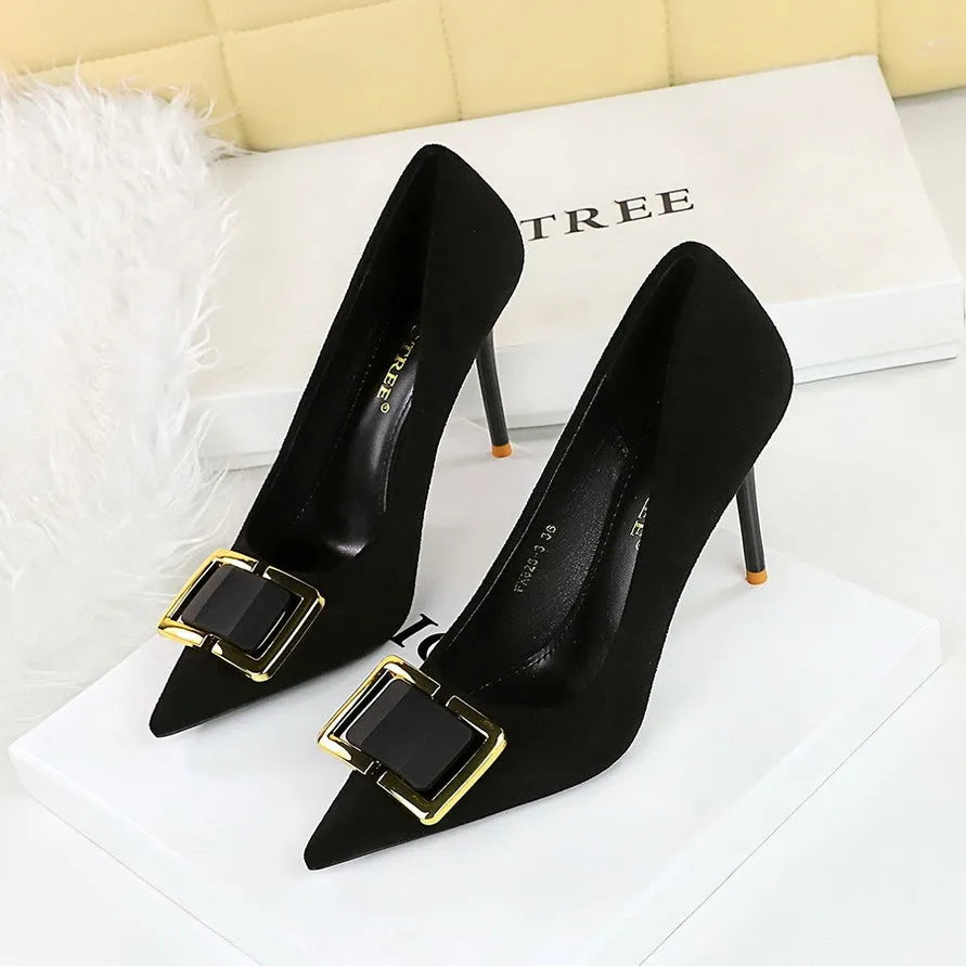 Black suede women's stiletto high heels with a pointed toe and a 9cm rubber sole.