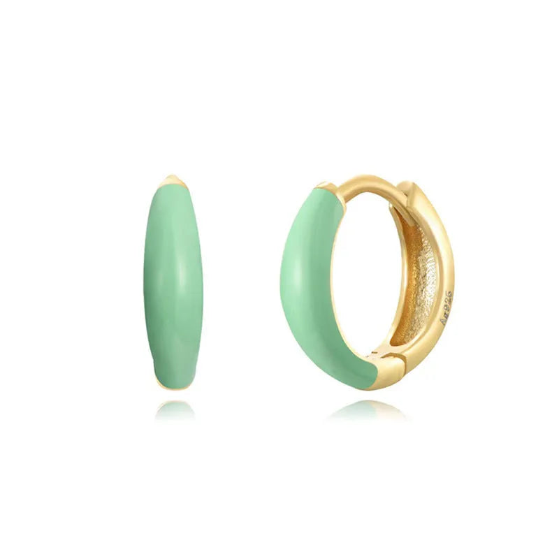 Curved oval epoxy earrings with colourful drip finish in geometric U-shape design