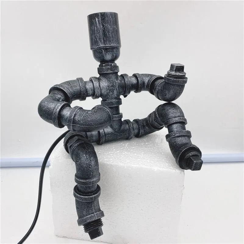 Industrial retro style table lamp made from iron pipes in retro colour with multiple design variations