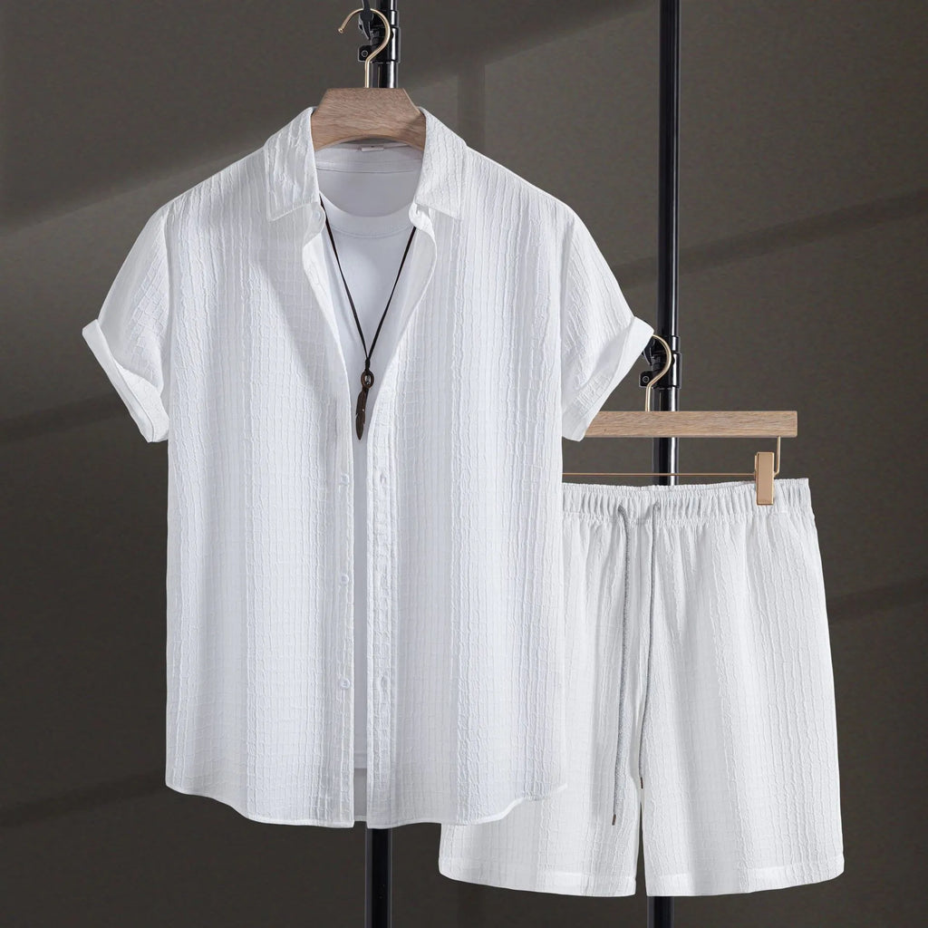 Men's white cotton blend jacquard short sleeve shirt and matching shorts laid flat
