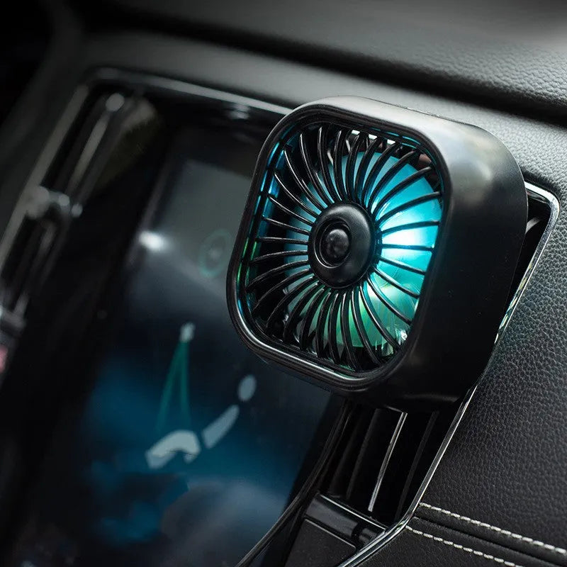 Compact black USB car fan with three speed buttons and charging cable