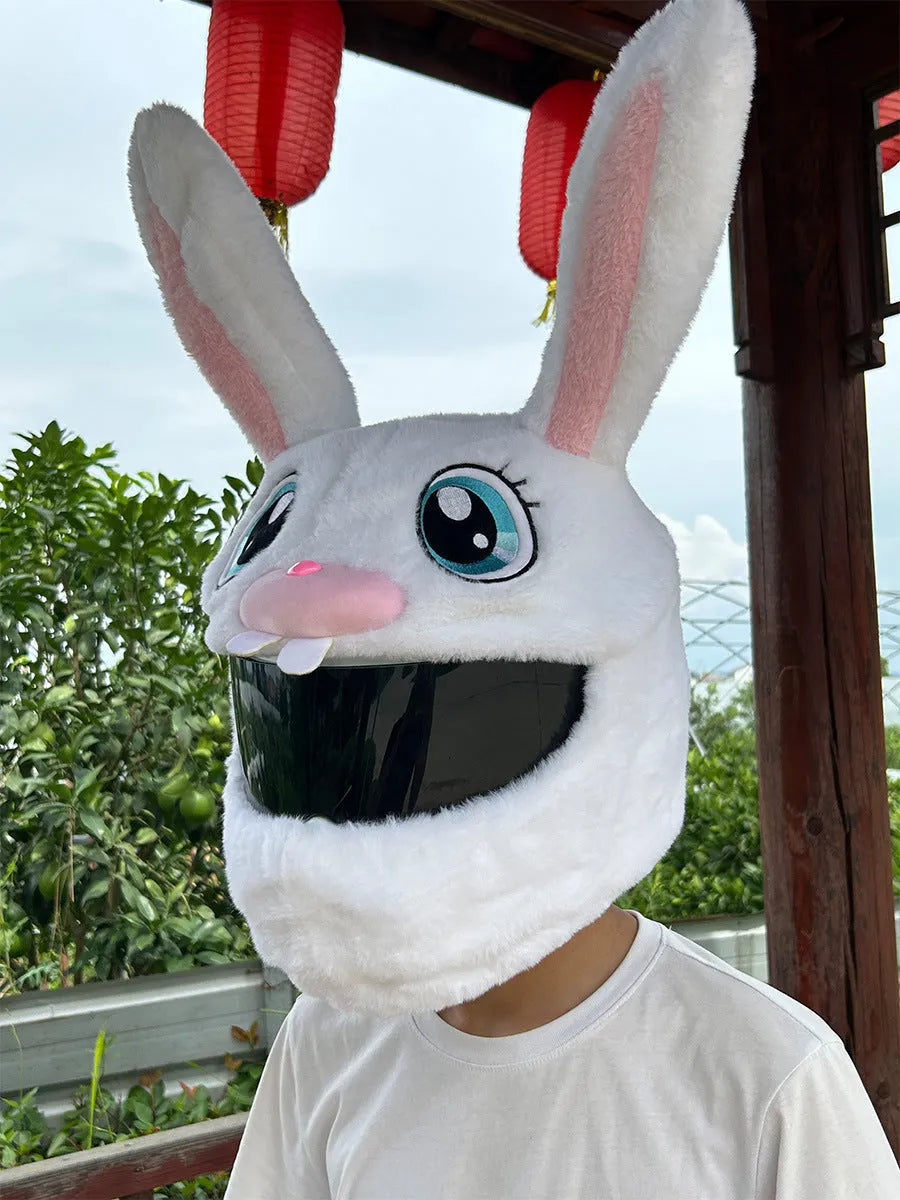 White plush rabbit head decorative cover on a motorcycle helmet for electric scooter commuting