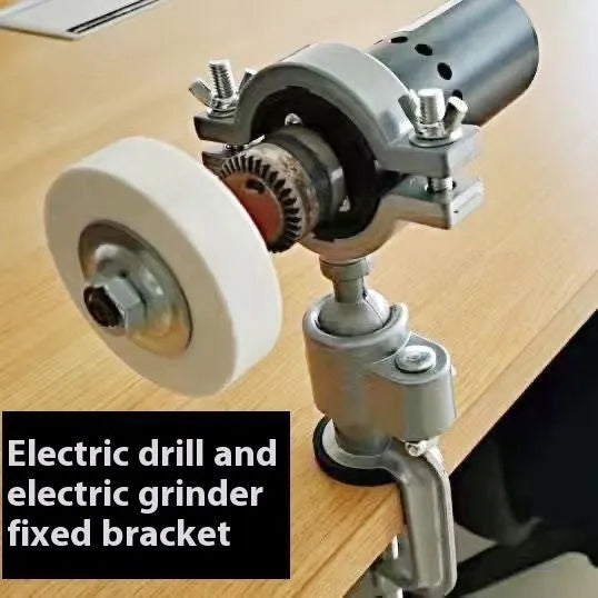 Small flat bracket-type clamp-on bench vise with a 360-degree rotating head on a workbench.