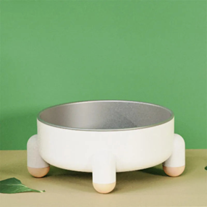 Green non-slip stainless steel pet bowl with a raised high foot design for dogs and cats