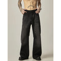Black loose straight-leg retro jeans on a mannequin, showing zipper fly and relaxed fit.