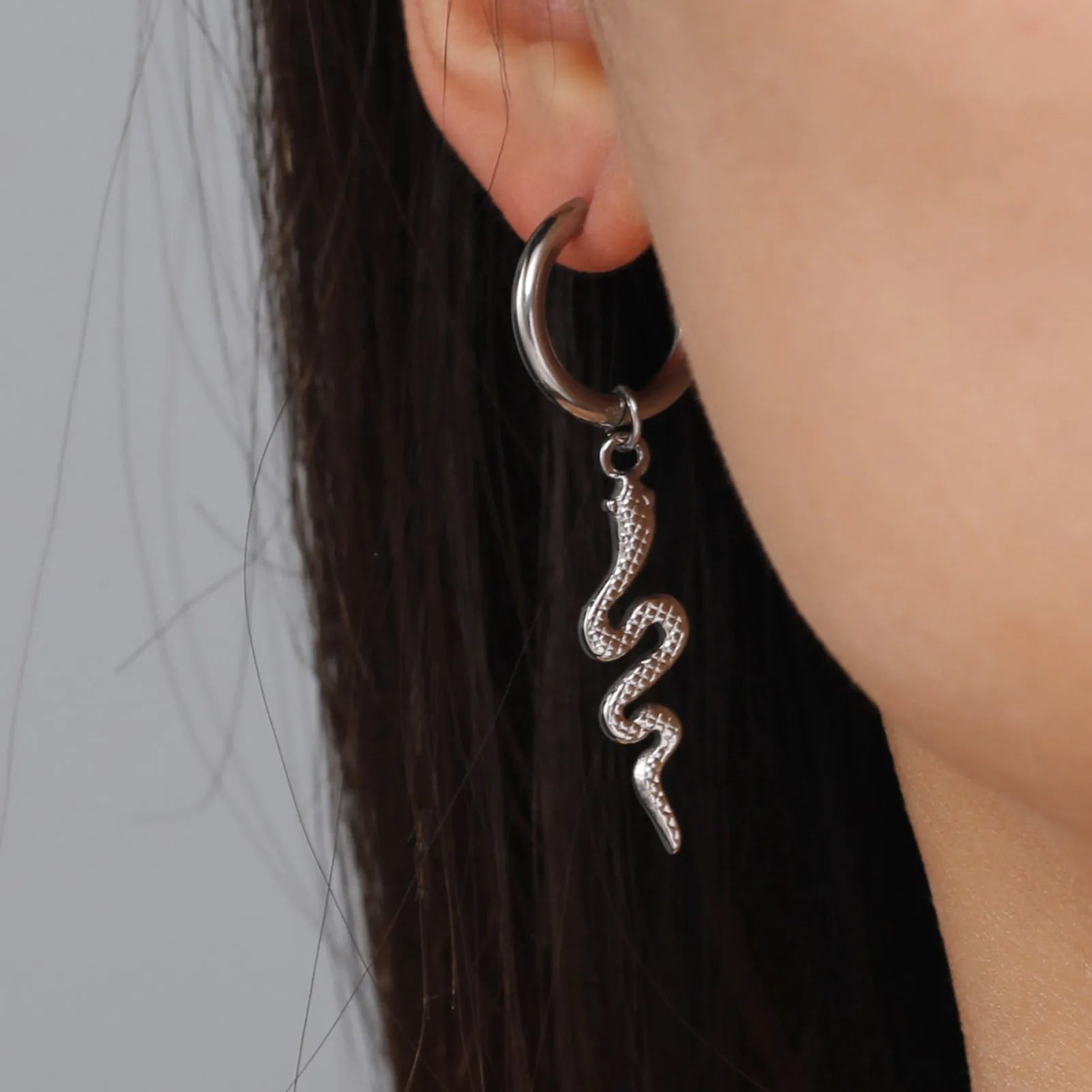 Stainless steel vintage snake-shaped clip-on earrings with gold plating.