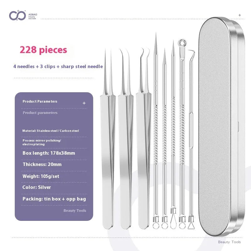 Four silver metal acne needles with fine pointed tips laid out on a flat surface.