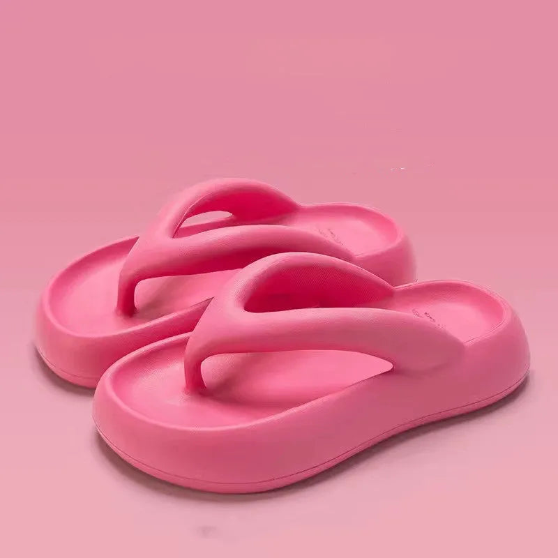 Solid colour EVA flip-flops with a thick sole and a decorative bow on the thong strap.