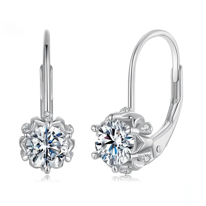 White gold plated sterling silver flower ear clip with moissanite centrepiece.
